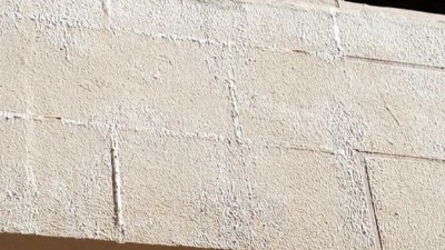 如何解決外墻水包水出現(xiàn)泛白、龜裂問題?